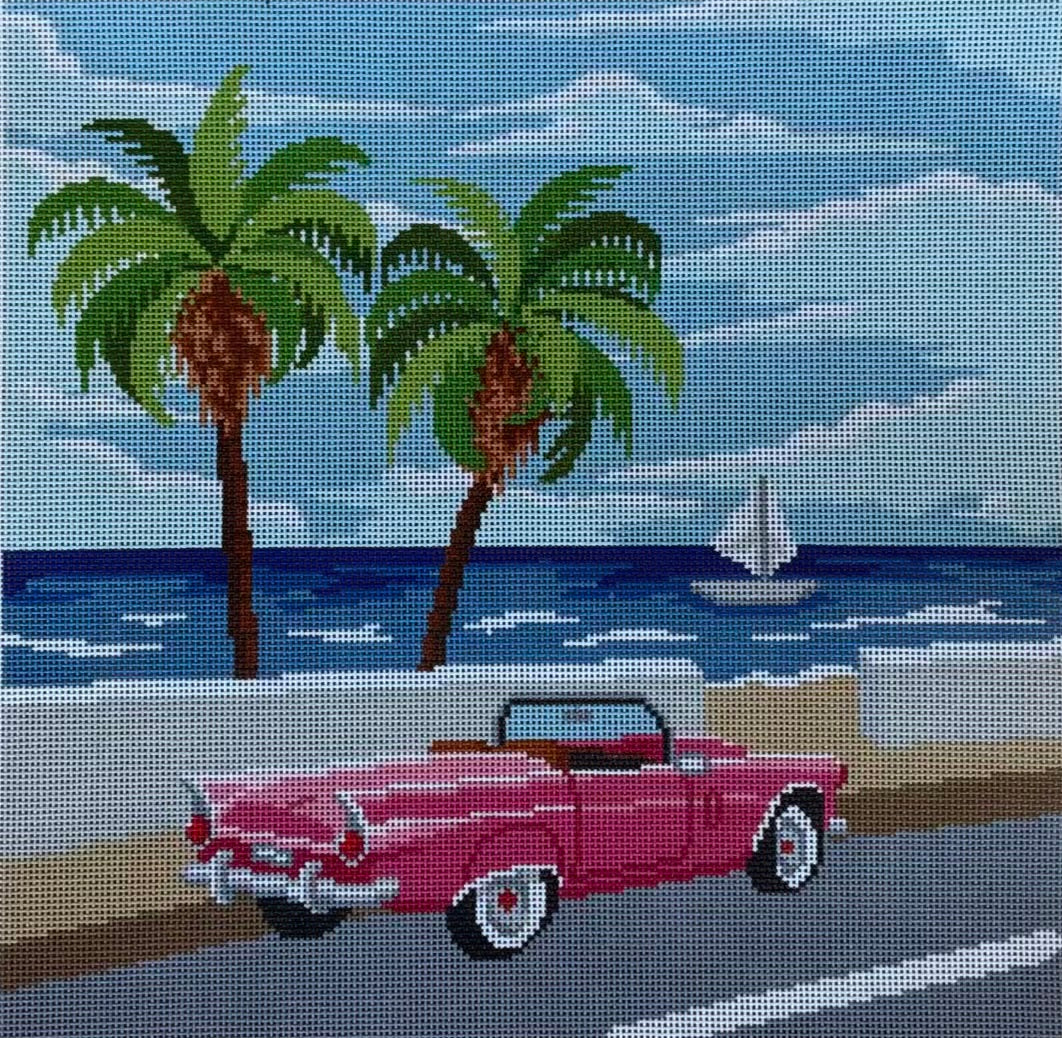 Vintage Pink Convertible on Ocean Side