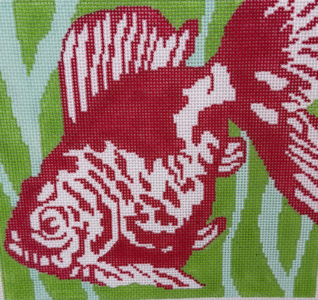 Red Goldfish on Green