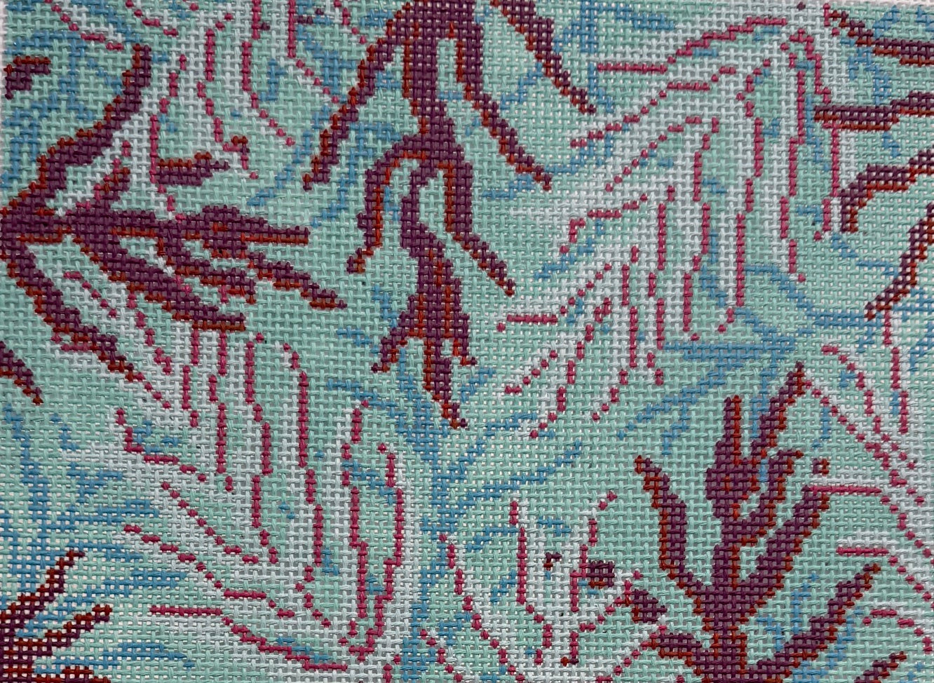 Seaweed in Red on Blue Water