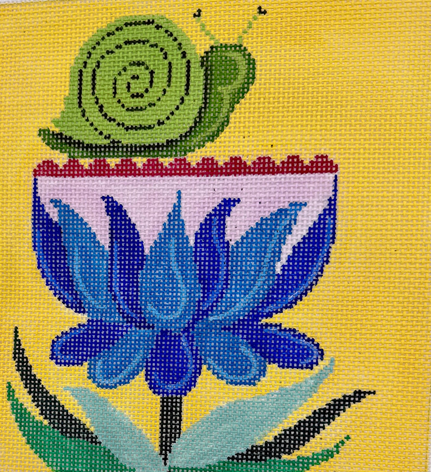 Snail on Flower on Yellow Background