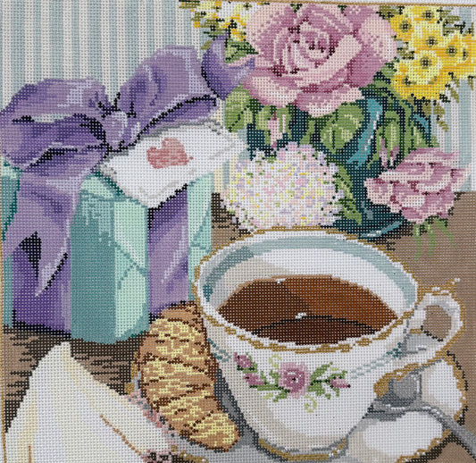 Teacup with Present and Flowers