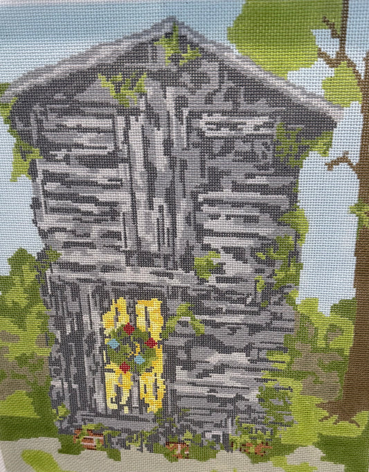 Spooky Cabin with Christmas Wreath