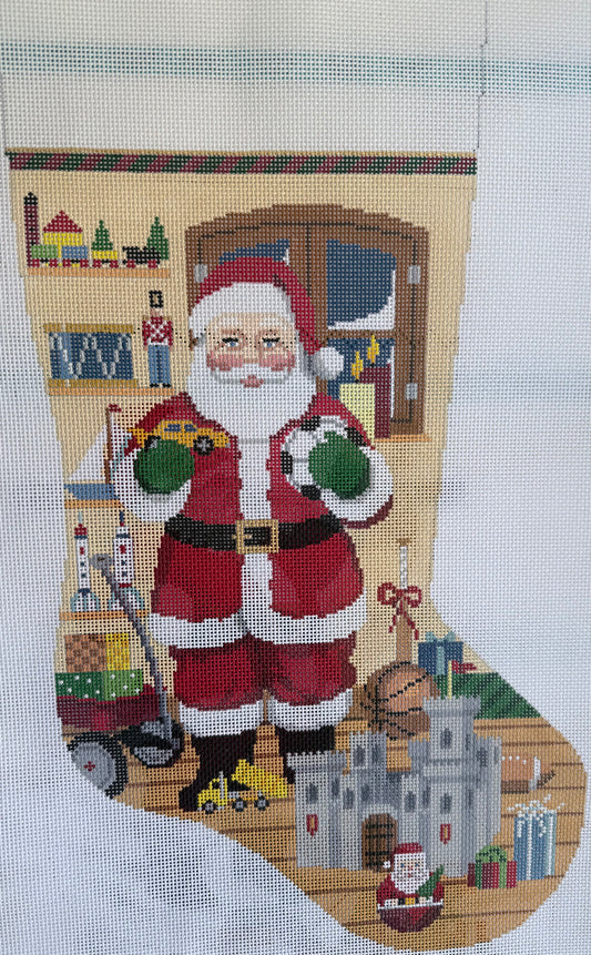 Santa Stocking with Toys and Castle by Snowy Window